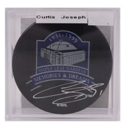 TORONTO MAPLE LEAFS -  CURTIS JOSEPH AUTOGRAPHED HOCKEY PUCK - (LOGO)