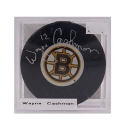 BRUINS OF BOSTON -  WAYNE CASHMAN AUTOGRAPHED HOCKEY PUCK - (LOGO)