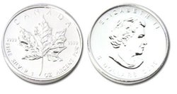 MAPLE LEAVES -  MAPLE LEAF - ONE OUNCE FINE SILVER COIN -  2010 CANADIAN COINS