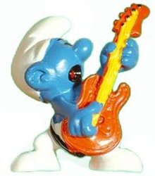 SMURFS -  ROCK'N ROLL SMURF - RED AND YELLOW GUITAR VARIETY -  1977 SMURFS 20023