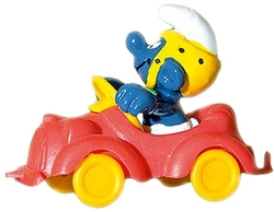 SMURFS -  SMURF IN RED CAR - SLIGHT RED WRITING UNDER THE FOOT 40210