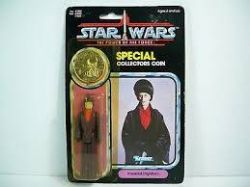 STAR WARS -  IMPERIAL DIGNITARY FIGURINE WITH SPECIAL COLLECTOR'S COIN (3.75