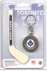 TORONTO MAPLE LEAFS -  TORONTO MAPLE LEAFS LOGO IN A HOCKEY MINI-PUCK AND MINI-STICK -  2009 CANADIAN COINS