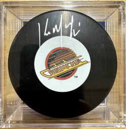 VANCOUVER CANUCKS -  KIRK MCLEAN AUTOGRAPHED HOCKEY PUCK -(LOGO)
