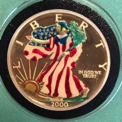 SILVER EAGLES -  PIÈCE D'UNE ONCE EN ARGENT PUR - VERSION COLORÉE (À L'AUBE DU NOUVEAU MILLÉNAIRE) -  PIÈCES DES ÉTATS-UNIS 2000