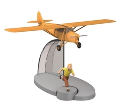 TINTIN -  AVION ORANGE DANS 